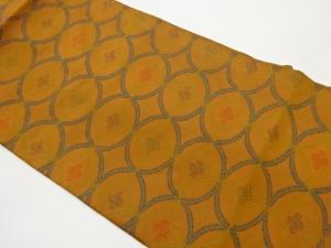 七宝に抽象模様織出し名古屋帯